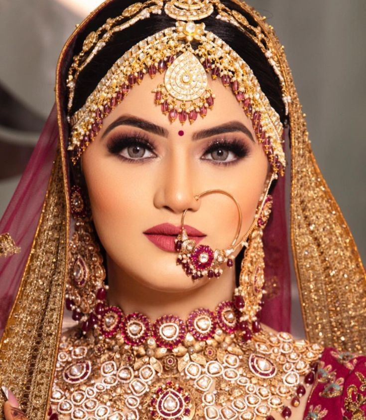 Bridal makeup artist applying final touches